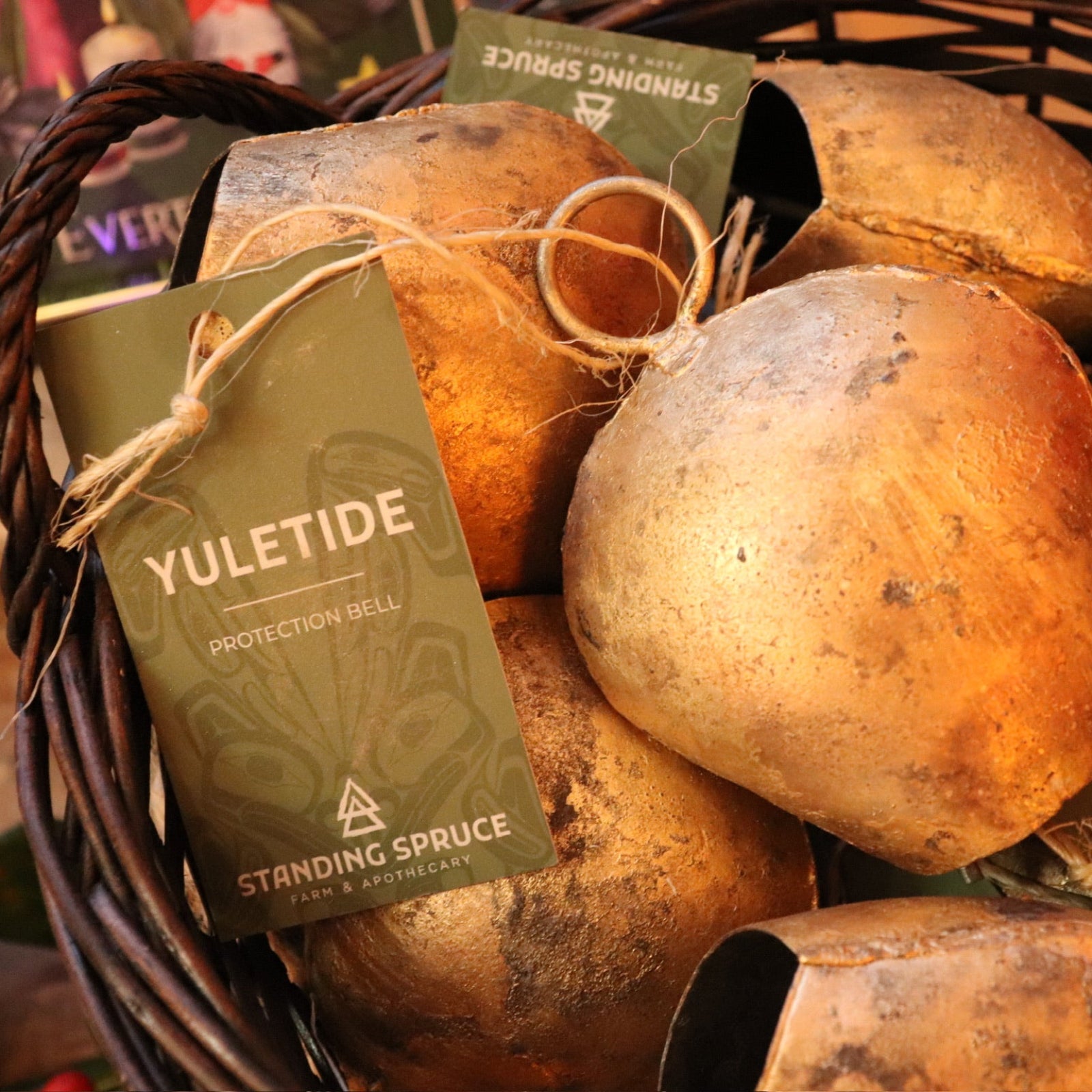 A basket of the large Yuletide Protection Bell.