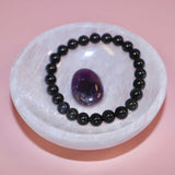 selenite crystal bowl on pink backdrop