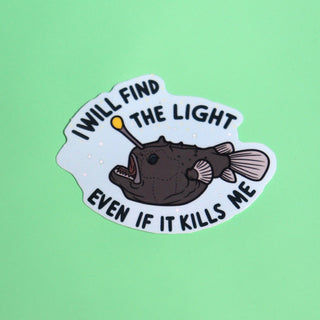 The Anglerfish Vinyl Sticker on a green background.