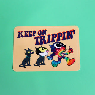 The Keep On Trippin 4 Inch Sticker on a green background.