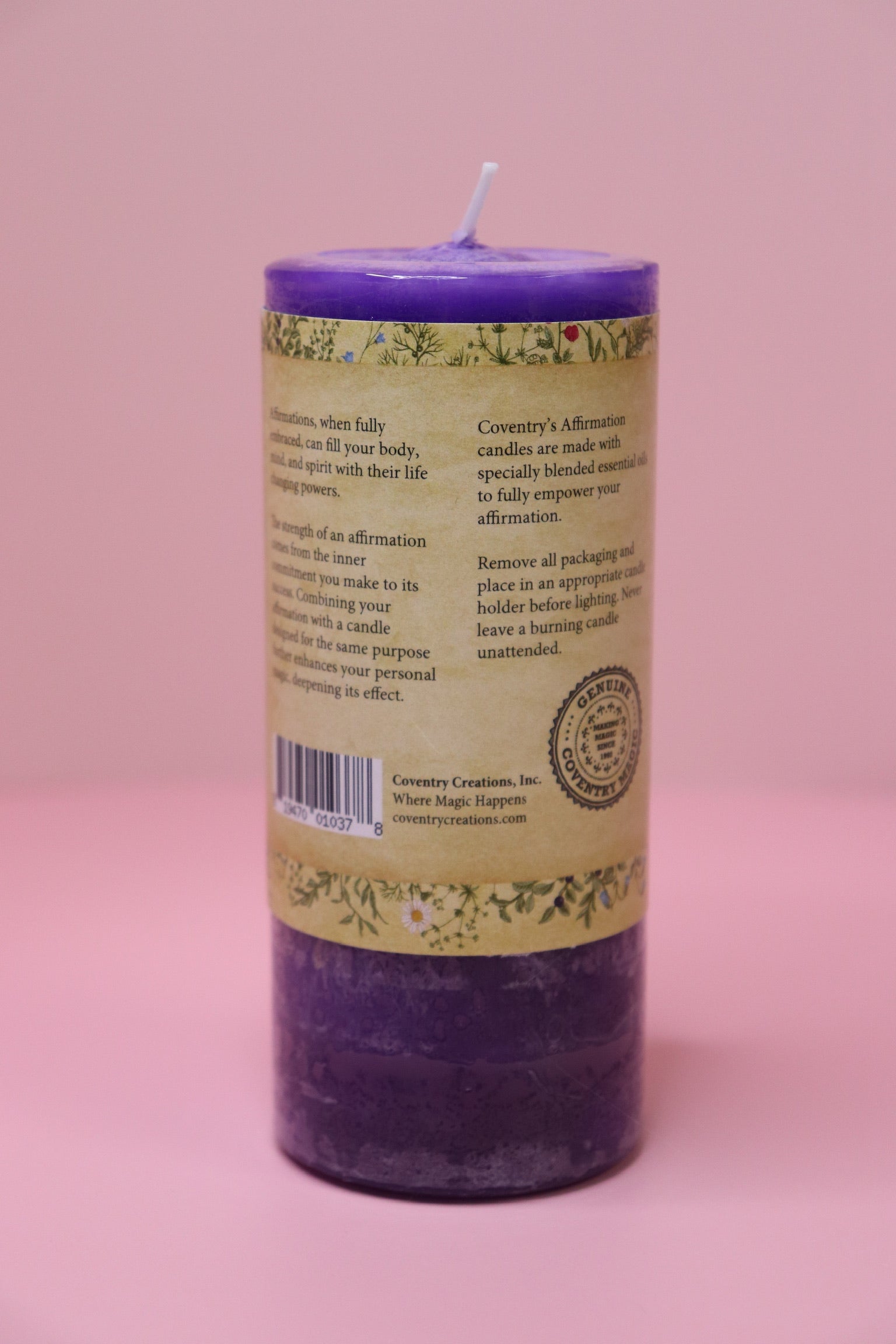 The back of the Affirmation Healing - Pillar Candle with Honeysuckle & Cedar on a pink background.