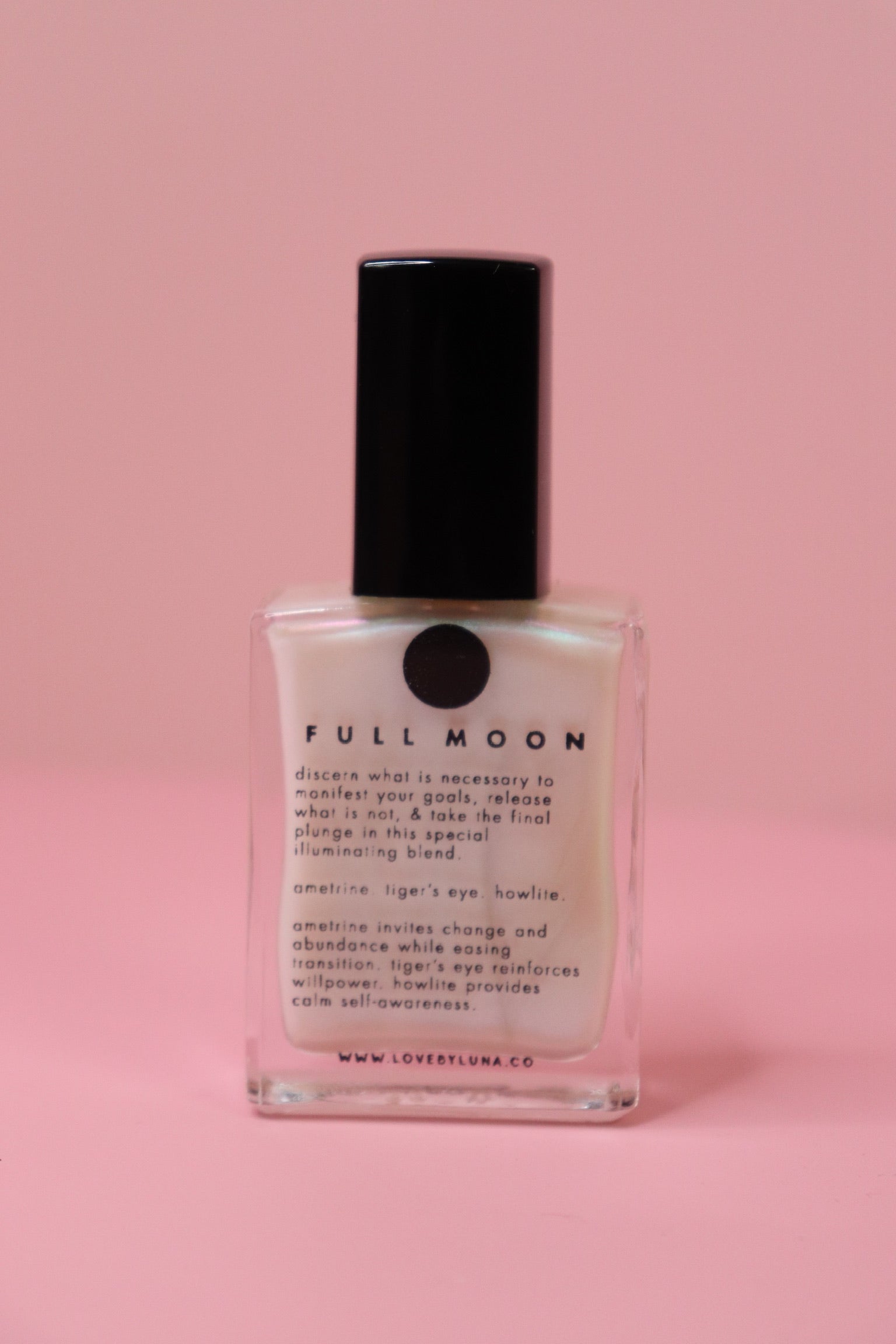 The Full Moon Nail Polish on a pink background.