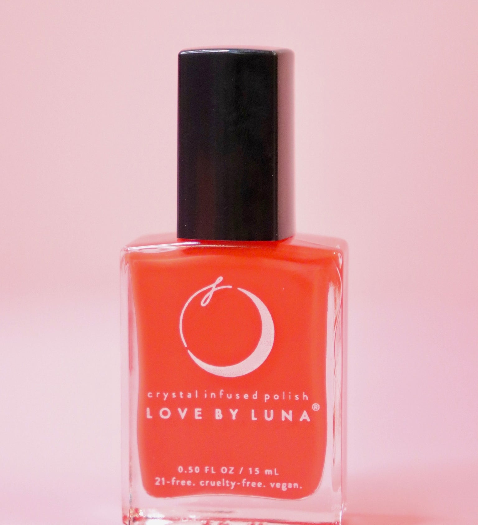 The Aries Zodiac Nail Polish with Micronized Red Jasper on a pink background.