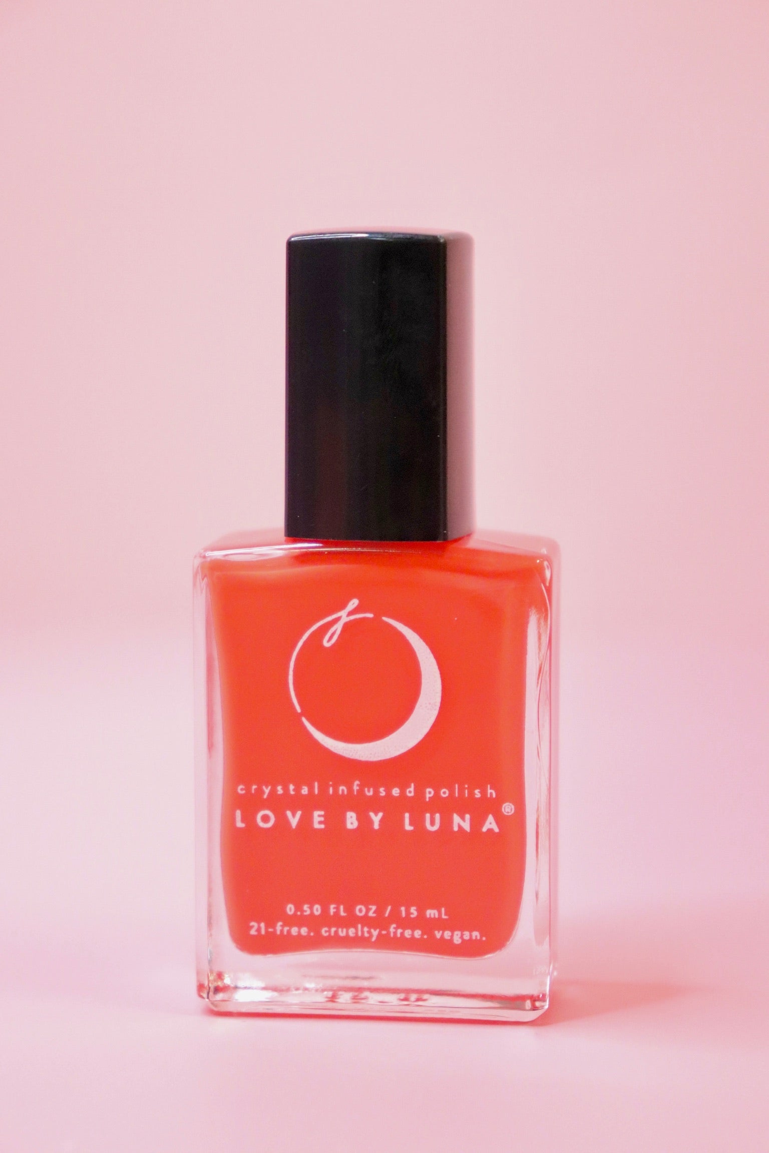 The Aries Zodiac Nail Polish with Micronized Red Jasper on a pink background.