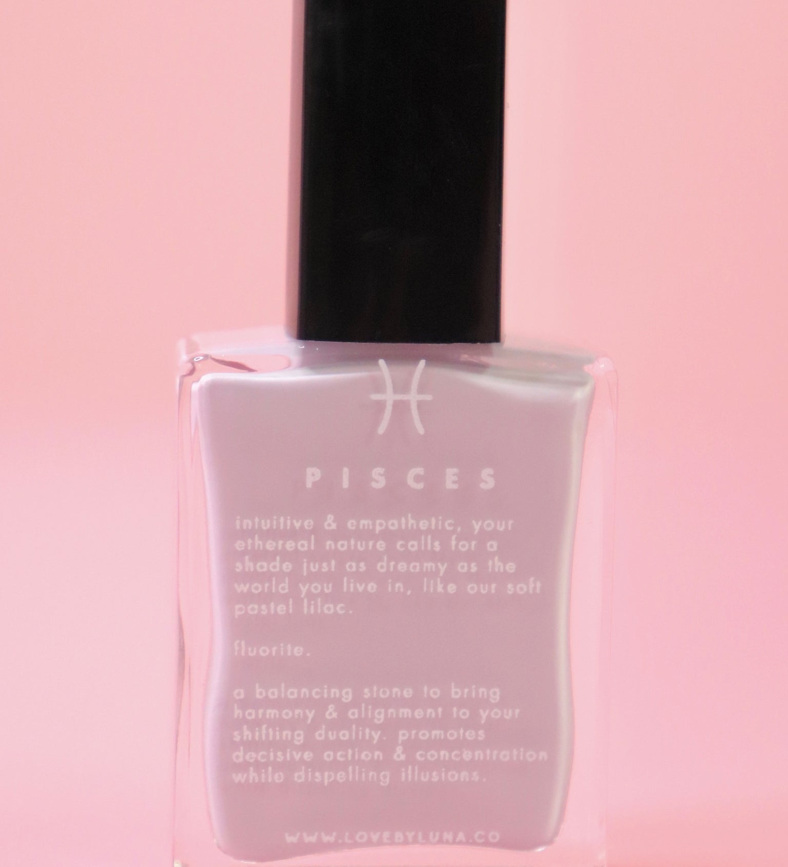 The Pisces Zodiac Nail Polish with Micronized Fluorite on a pink background.