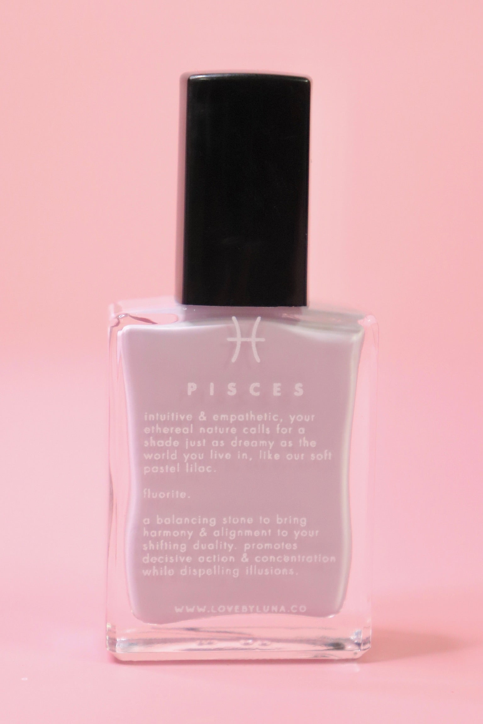 The Pisces Zodiac Nail Polish with Micronized Fluorite on a pink background.