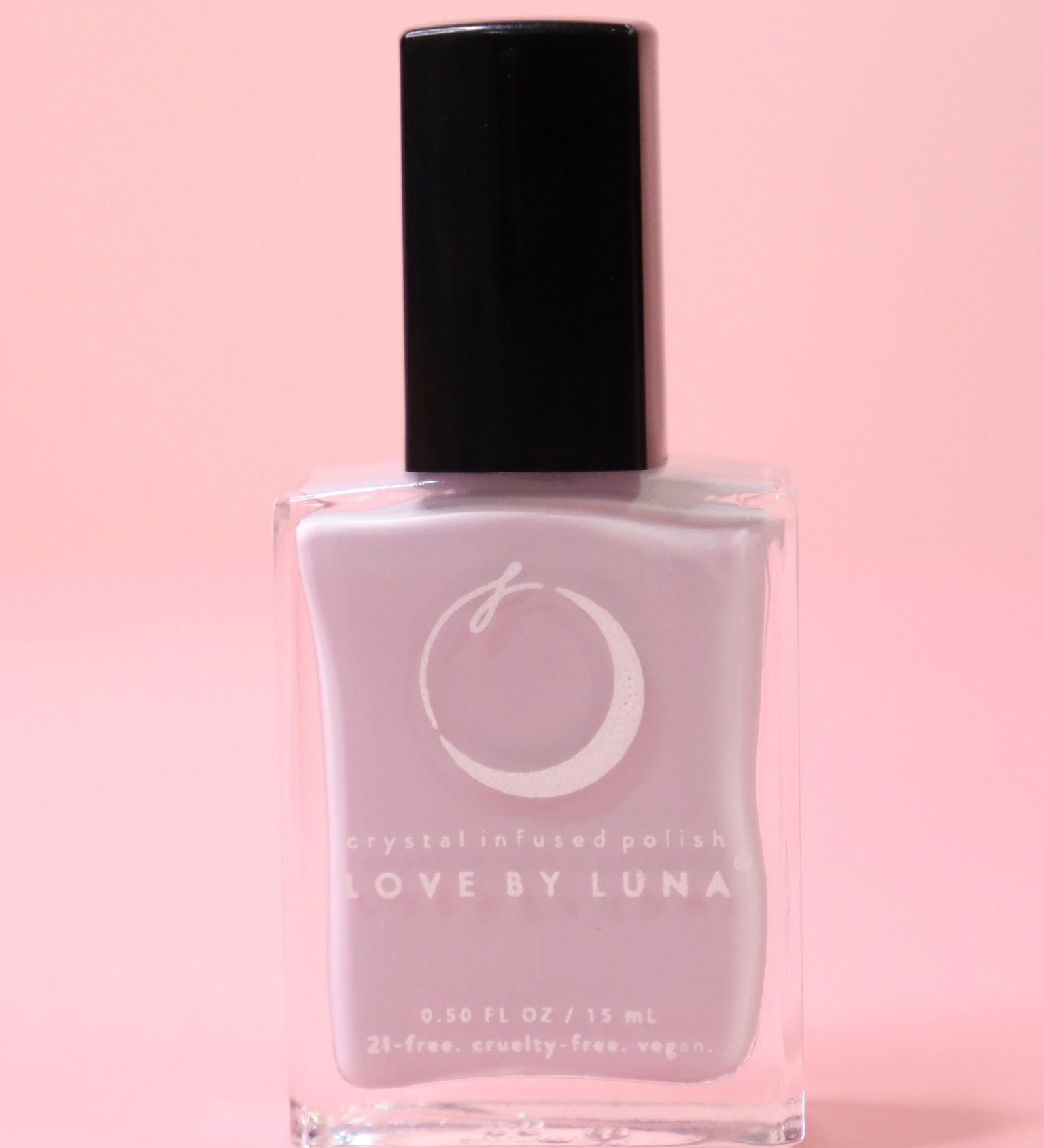 The Pisces Zodiac Nail Polish with Micronized Fluorite on a pink background.