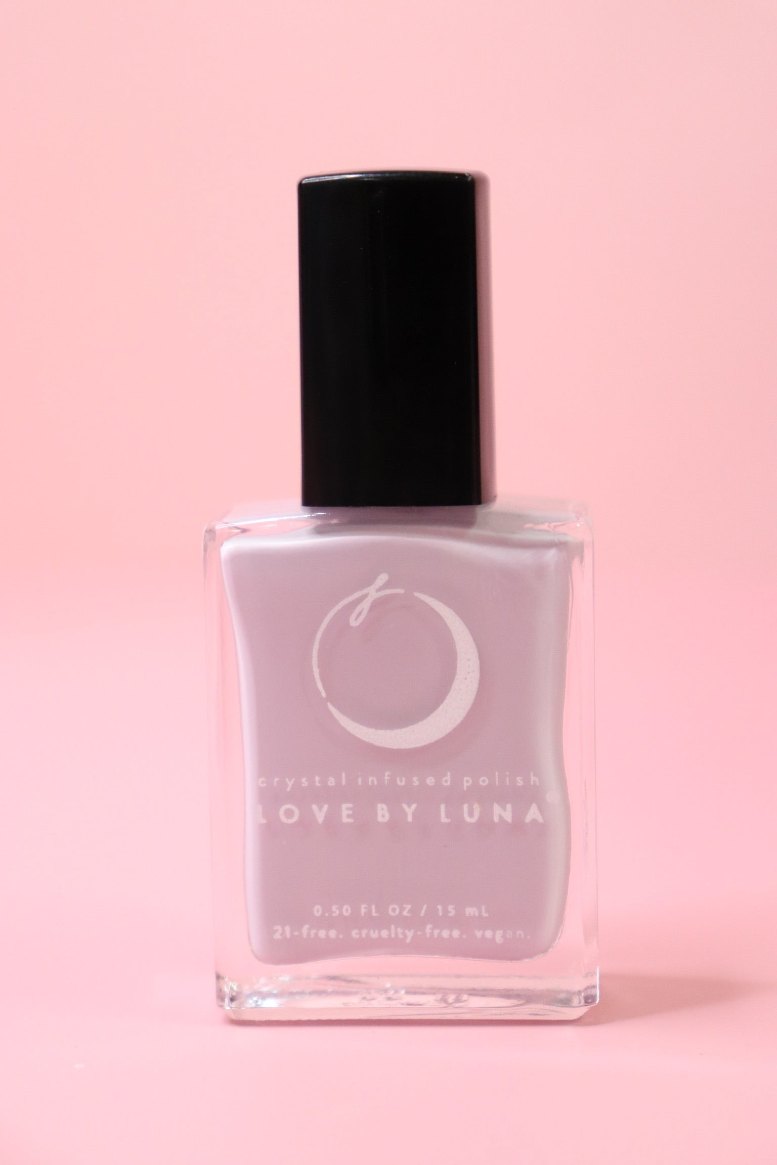 The Pisces Zodiac Nail Polish with Micronized Fluorite on a pink background.