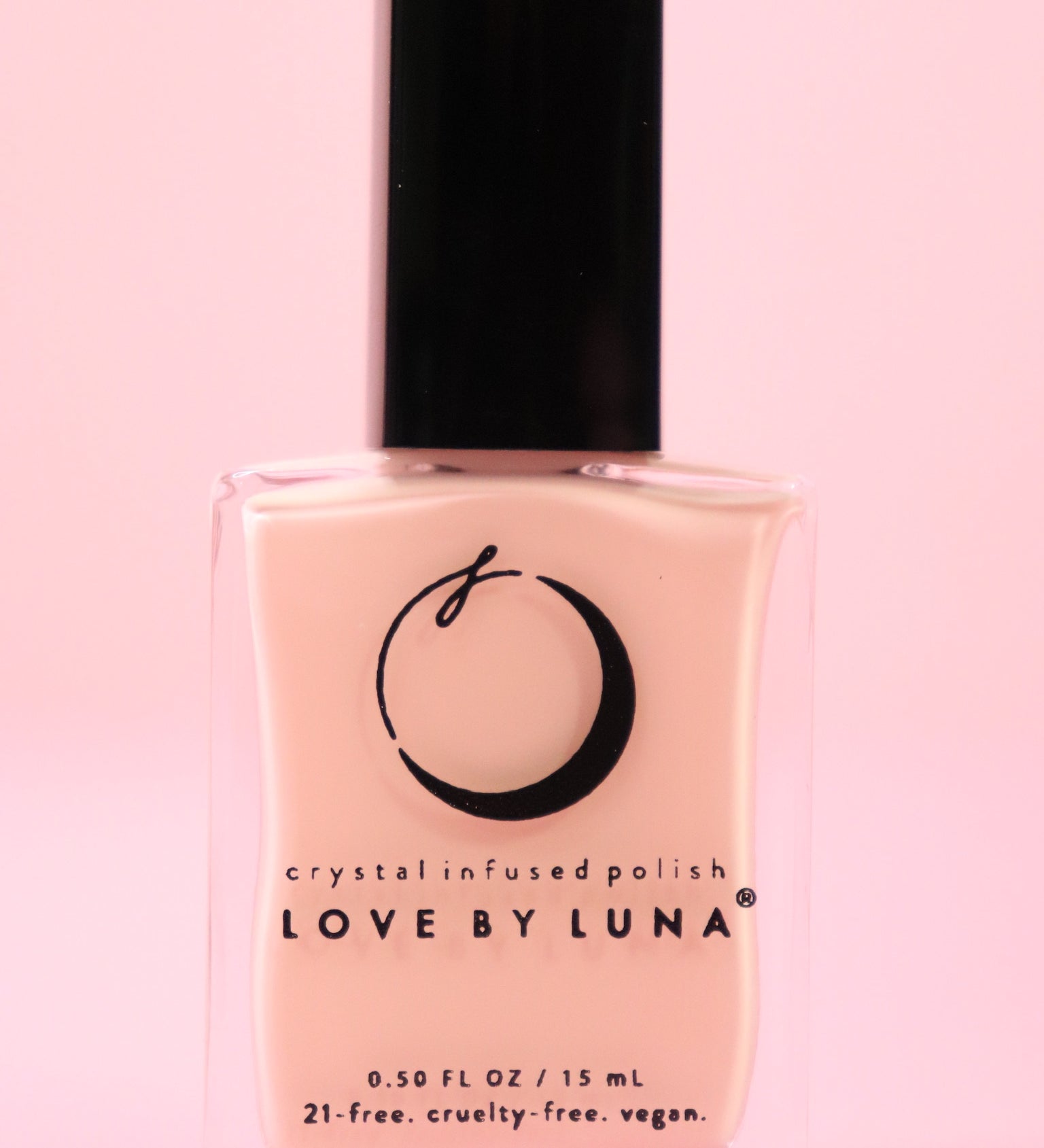 The Hope & Healing Nail Polish with Micronized Morganite on a pink background.