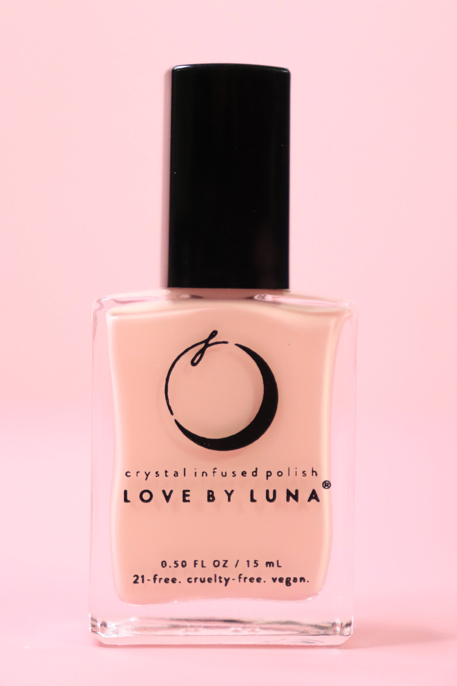 The Hope & Healing Nail Polish with Micronized Morganite on a pink background.