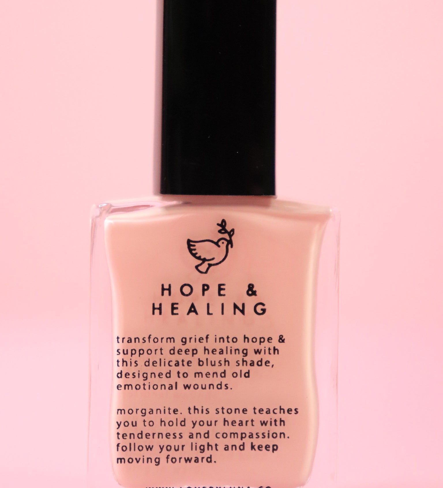 The Hope & Healing Nail Polish with Micronized Morganite on a pink background.