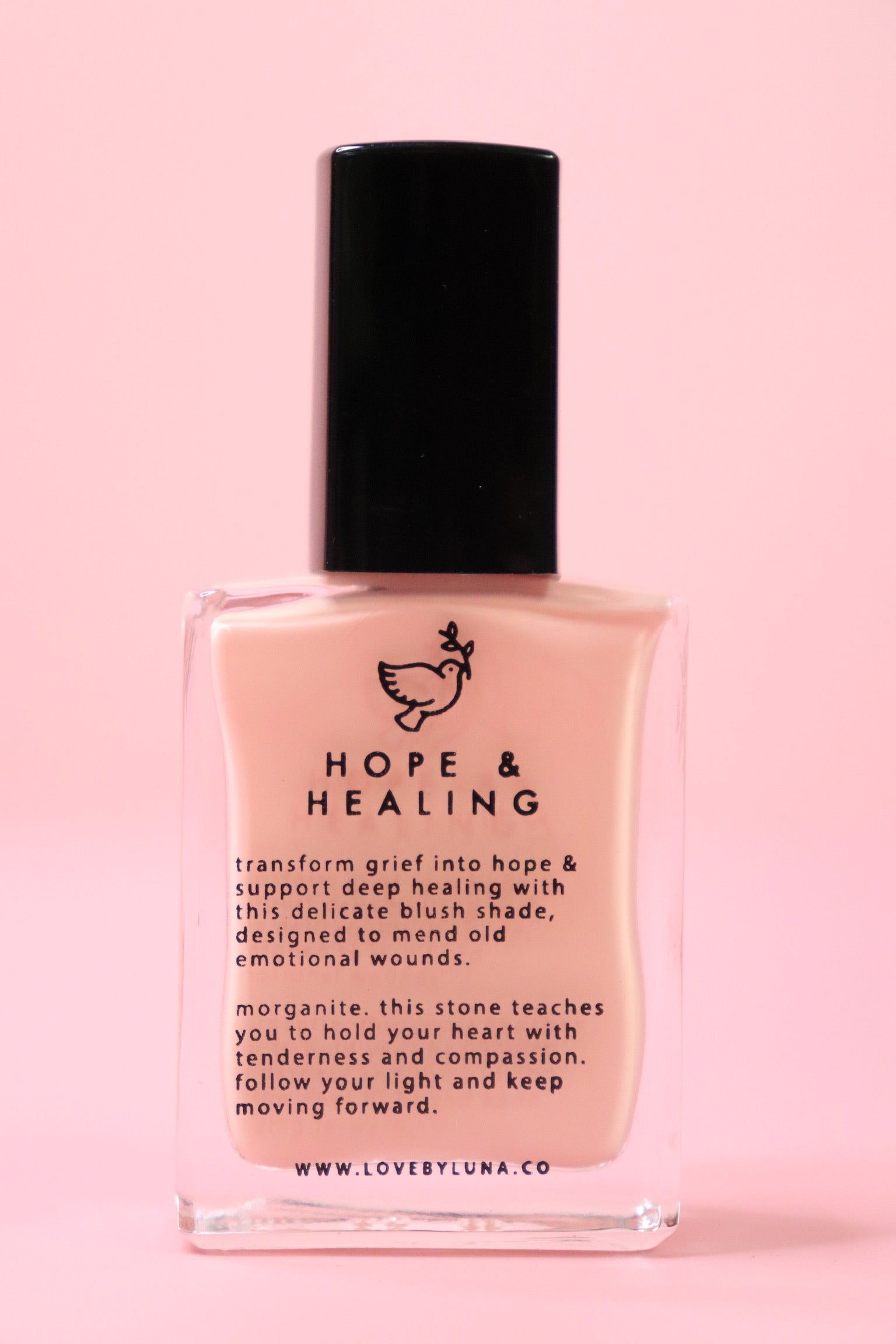 The Hope & Healing Nail Polish with Micronized Morganite on a pink background.