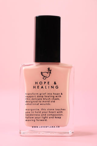 The Hope & Healing Nail Polish with Micronized Morganite on a pink background.