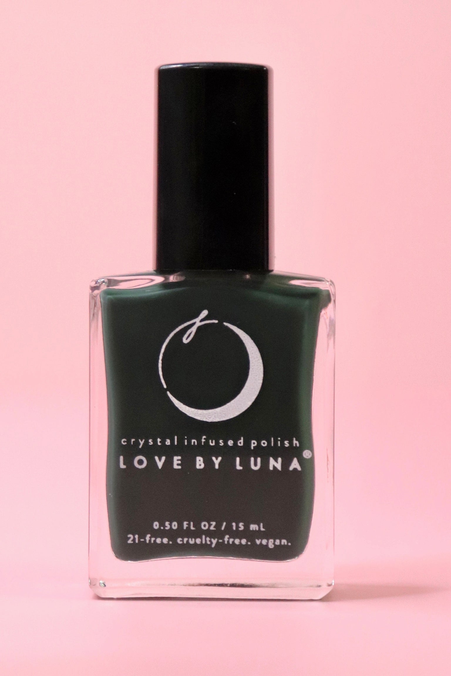 The Regeneration Nail Polish with Micronized Bloodstone on a pink background.