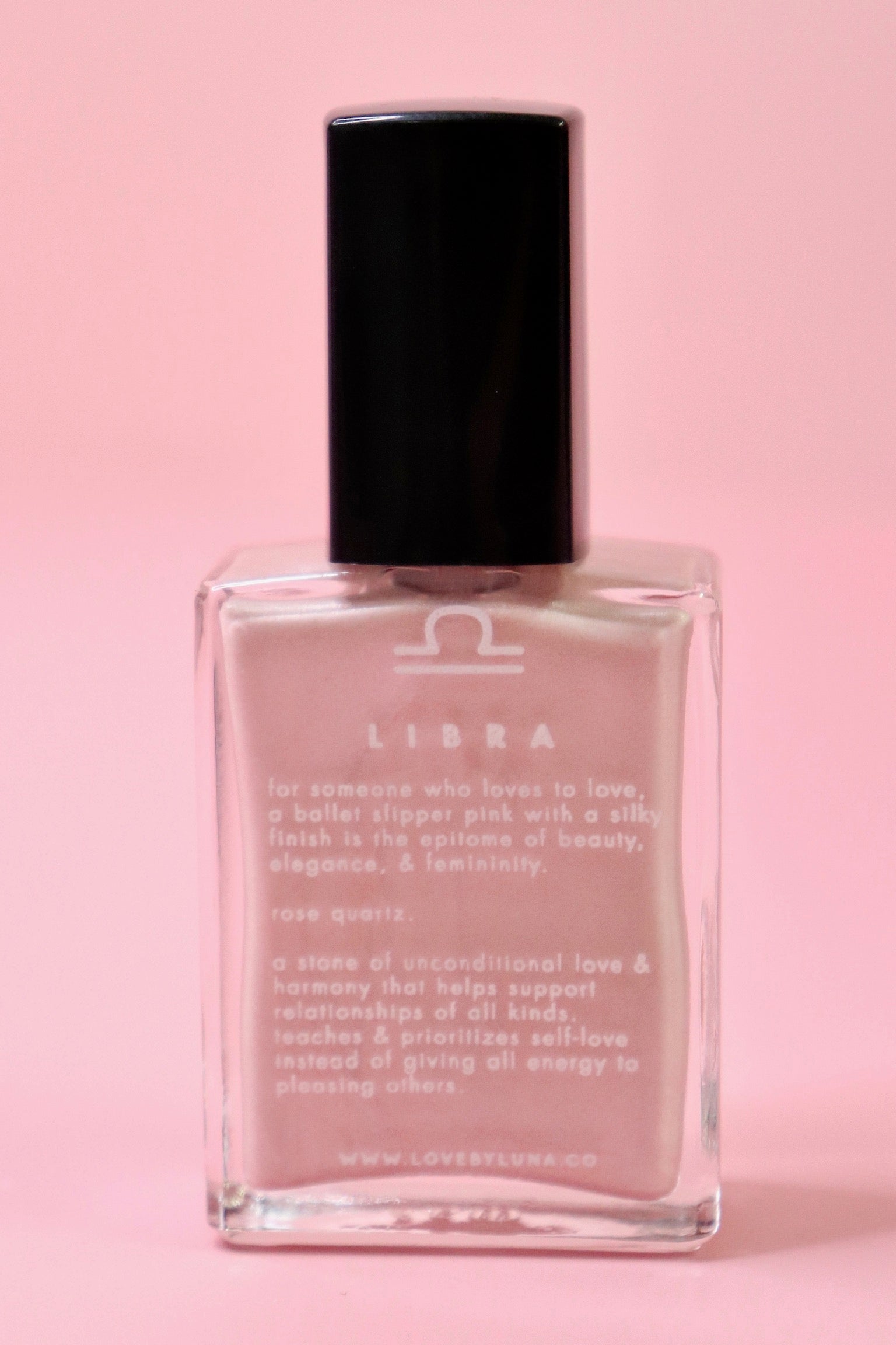 The Libra Zodiac Nail Polish with Micronized Rose Quartz in a pink background.
