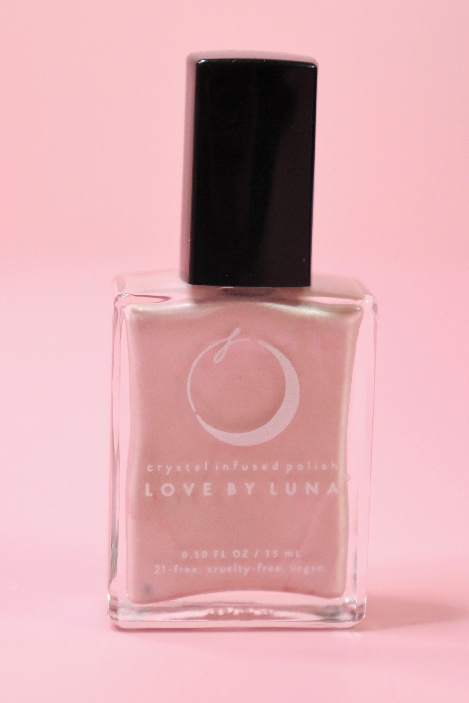 The Libra Zodiac Nail Polish with Micronized Rose Quartz in a pink background.