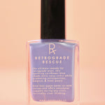 The Retrograde Rescue Nail Polish with Micronized Blue Lace Agate on a pink background.
