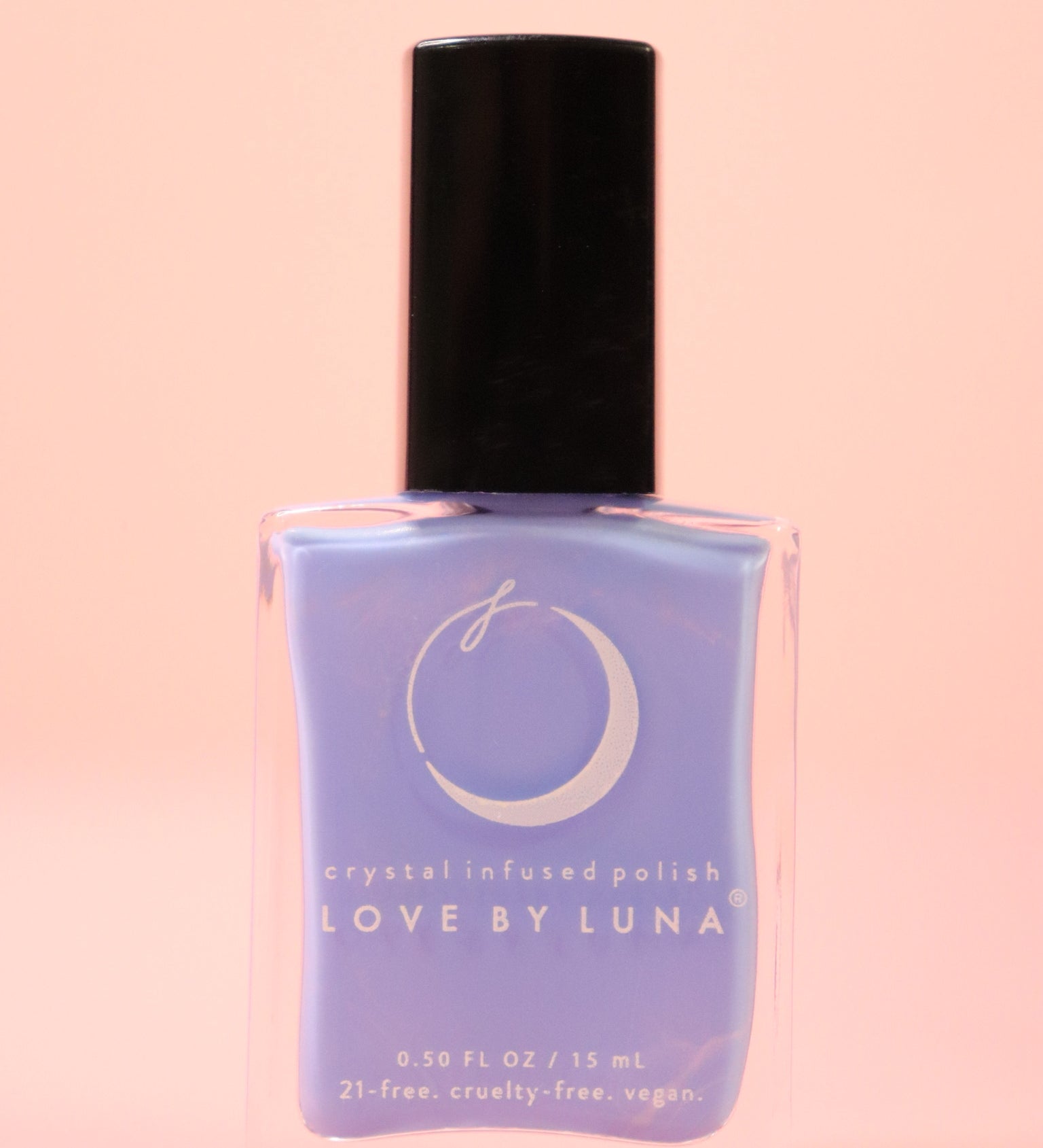 The Retrograde Rescue Nail Polish with Micronized Blue Lace Agate on a pink background.