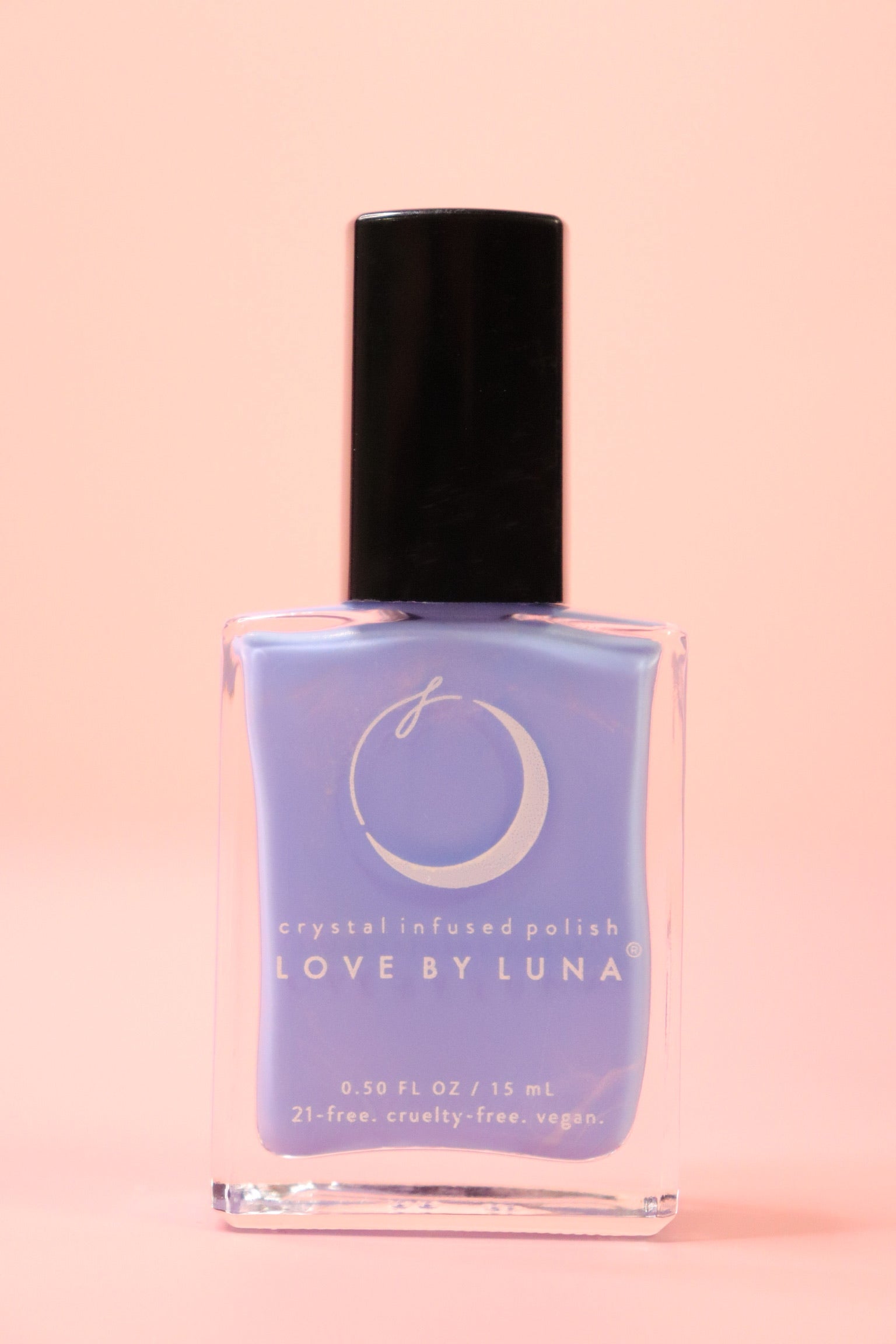 The Retrograde Rescue Nail Polish with Micronized Blue Lace Agate on a pink background.