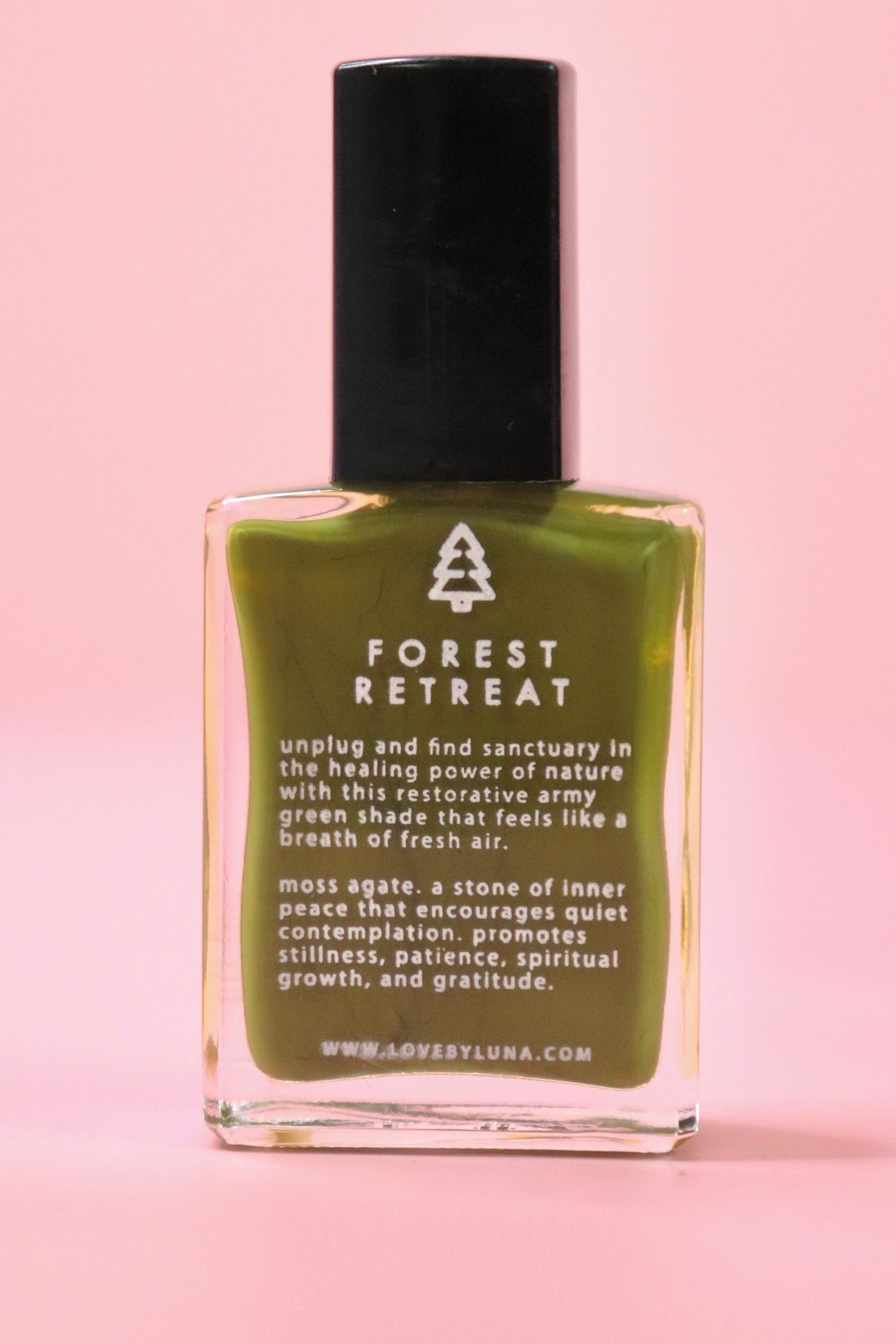 The Forest Retreat Nail Polish with Micronized Moss Agate on a pink background.