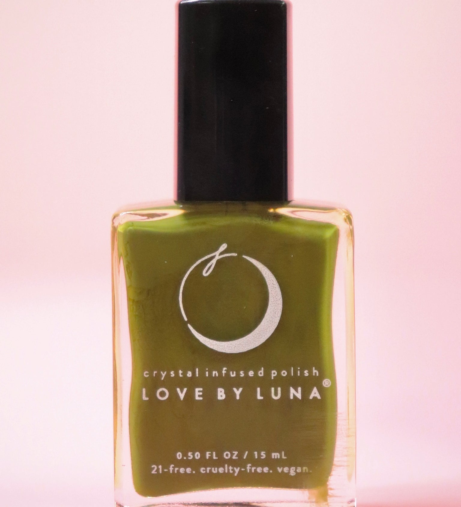 The Forest Retreat Nail Polish with Micronized Moss Agate on a pink background.