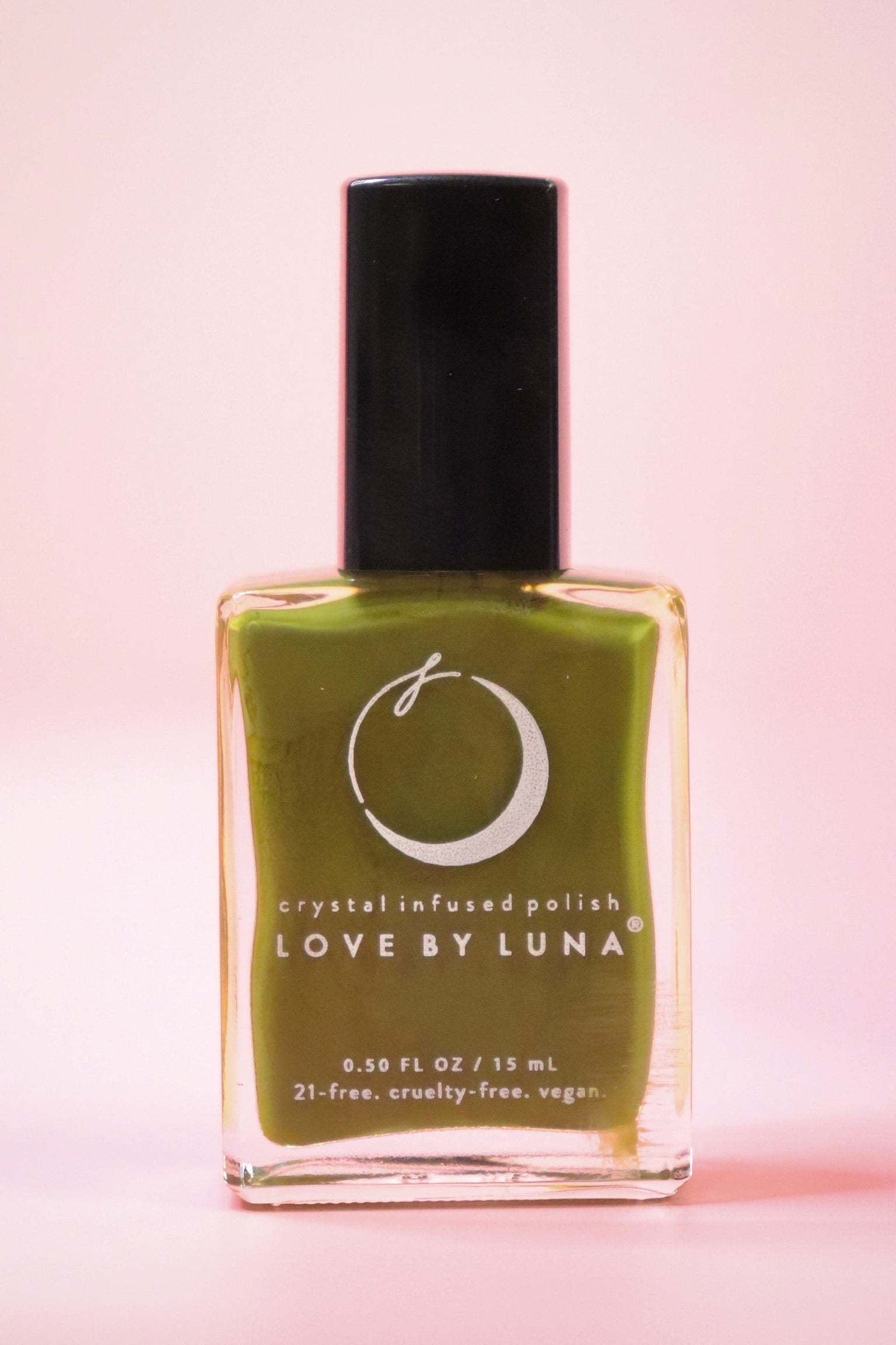 The Forest Retreat Nail Polish with Micronized Moss Agate on a pink background.
