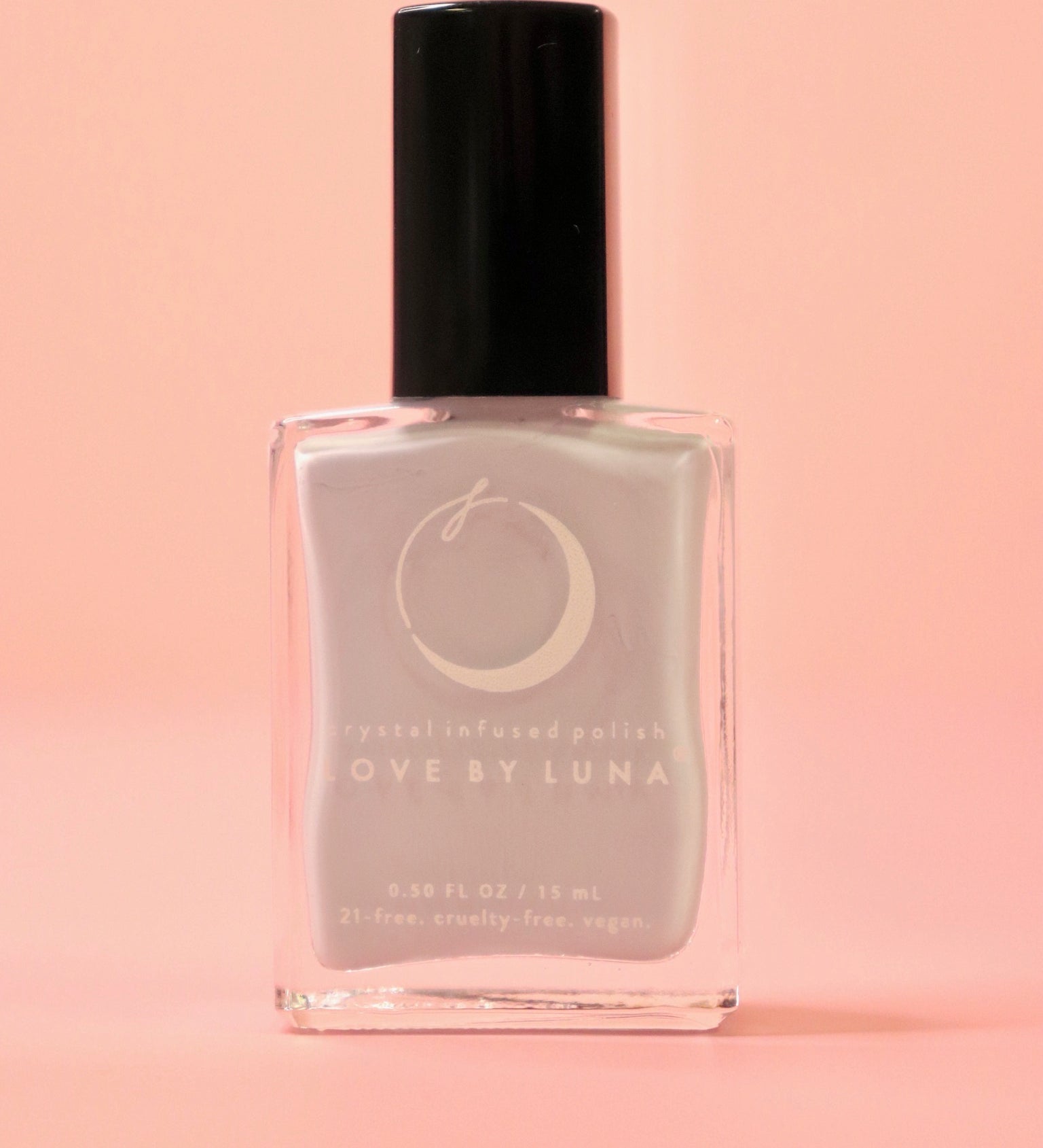 The Cancer Zodiac Nail Polish with Micronized Moonstone on a pink background.