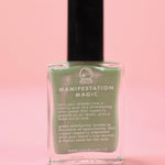 The Manifestation Magic Nail Polish with Micronized Green Aventurine on a pink background.