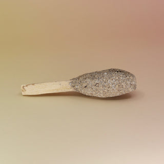 The White Sage and Palo Santo Pops - 3"-4" Smudge Stick on a pink and yellow background.