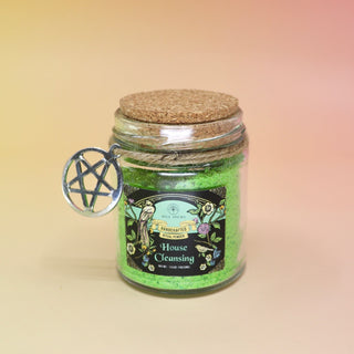 The House Cleansing Ritual Spell Powder Jar - 3.5 oz on a pink and yellow background.