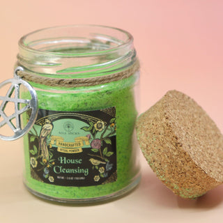 The House Cleansing Ritual Spell Powder Jar - 3.5 oz on a pink and yellow background.