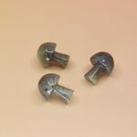 3 Mini Crystal Gemstone Mushrooms on orange background