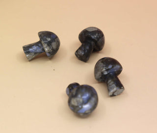 4 Mini Crystal Gemstone Mushrooms on orange background