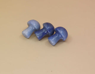 3 Mini Crystal Gemstone Mushrooms on orange background