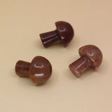 3 Mini Crystal Gemstone Mushrooms on orange background