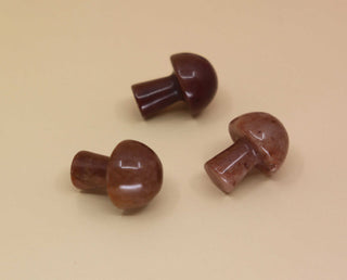 3 Mini Crystal Gemstone Mushrooms on orange background