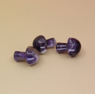3 Mini Crystal Gemstone Mushrooms on orange background