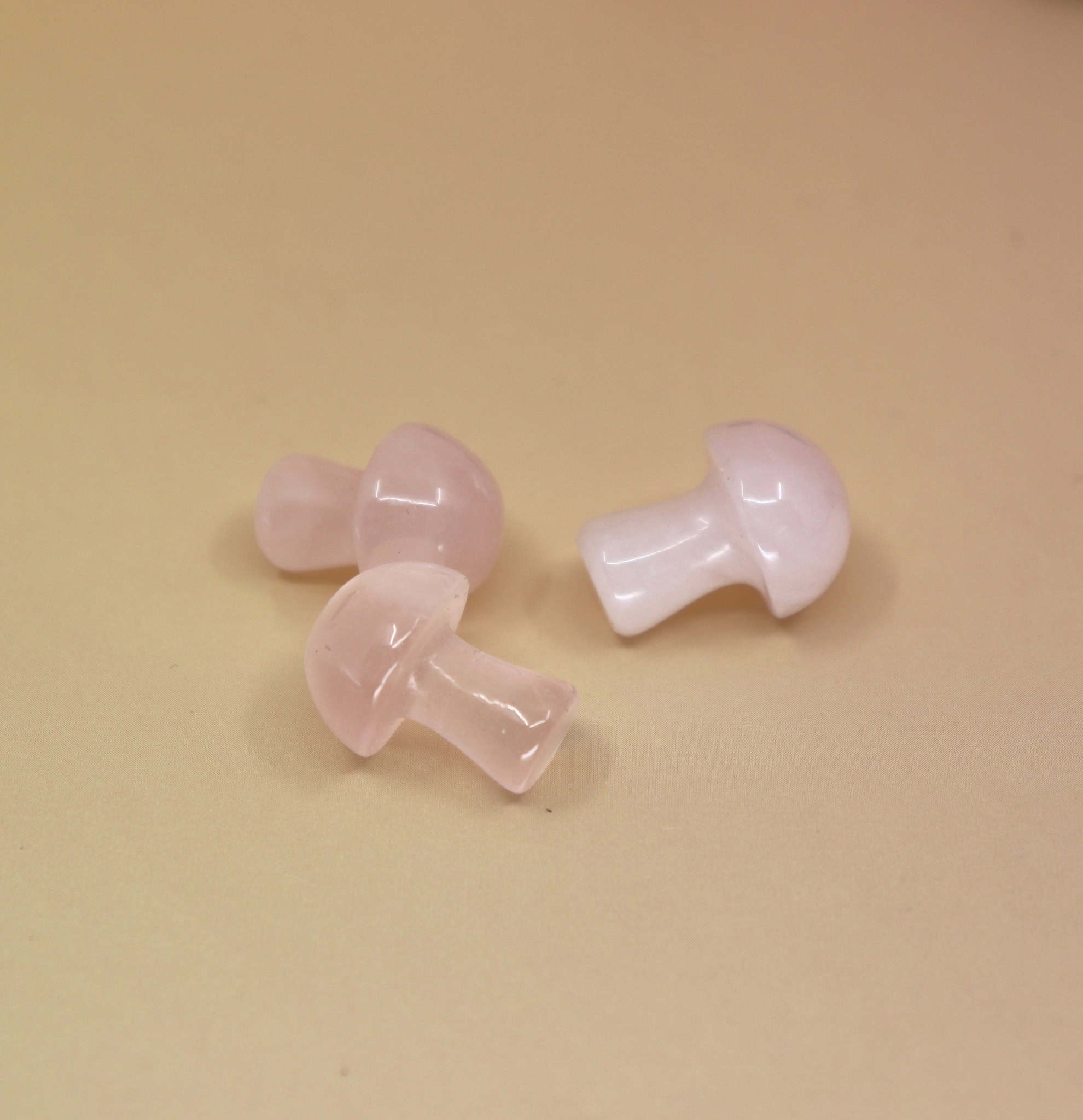 3 Mini Crystal Gemstone Mushrooms on orange background