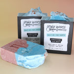 Three of the Purifying Soleseife Bar Soaps on a peach-colored background.