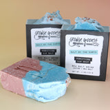 Three of the Purifying Soleseife Bar Soaps on a peach-colored background.