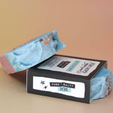 Two of the Purifying Soleseife Bar Soaps on a peach-colored background.