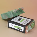 Two of the Pearlgarden - Protecting Aloe Vera Soaps on a peach-colored background.