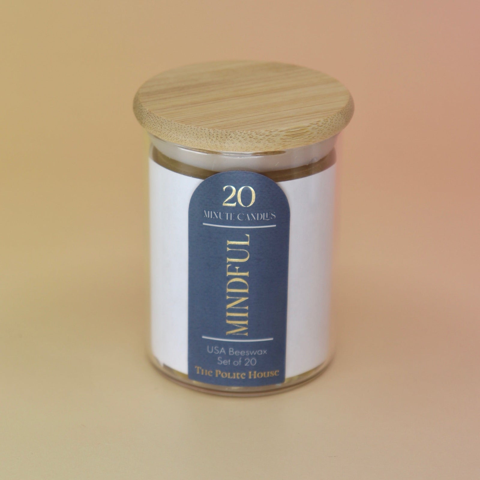 The 20 Minute Beeswax Candle Set: Mindful (Set of 20) on a light pink background.