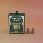 The back of the Mayan Copal + Desert Sage Incense Cone with two of its incense cones next to it.