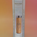 The Bhavana Bamboo Infuser Traveler Tumbler container on a pink and yellow background.