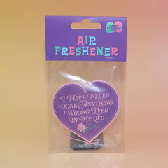 The I Have Never Done Anything Wrong - Candy Scented Air Freshener on a pink and yellow background.