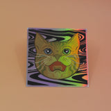 The Cozmik Love Cat 3" Holographic Vinyl Sticker on a light pink background.