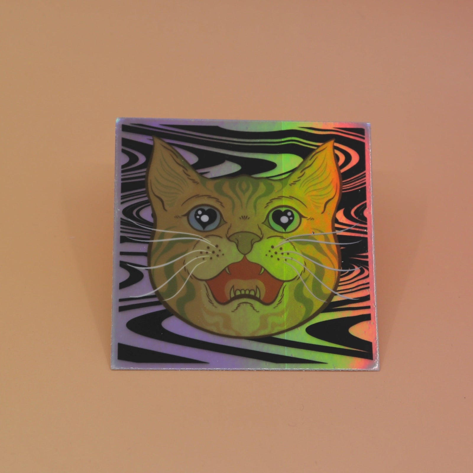The Cozmik Love Cat 3" Holographic Vinyl Sticker on a light pink background.