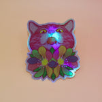 The Sapphic Flower Kitty 4" Holographic Vinyl Sticker on a light pink background.