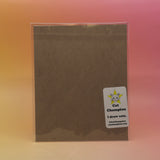 The back of the Orange Psychic Spongecake Cat - 8x10 Print on a pink and yellow background.